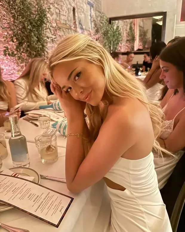 In a series of snaps shared on Instagram, Olivia Dunne was pictured at a Noho restaurant with a number of friends wearing white dresses.